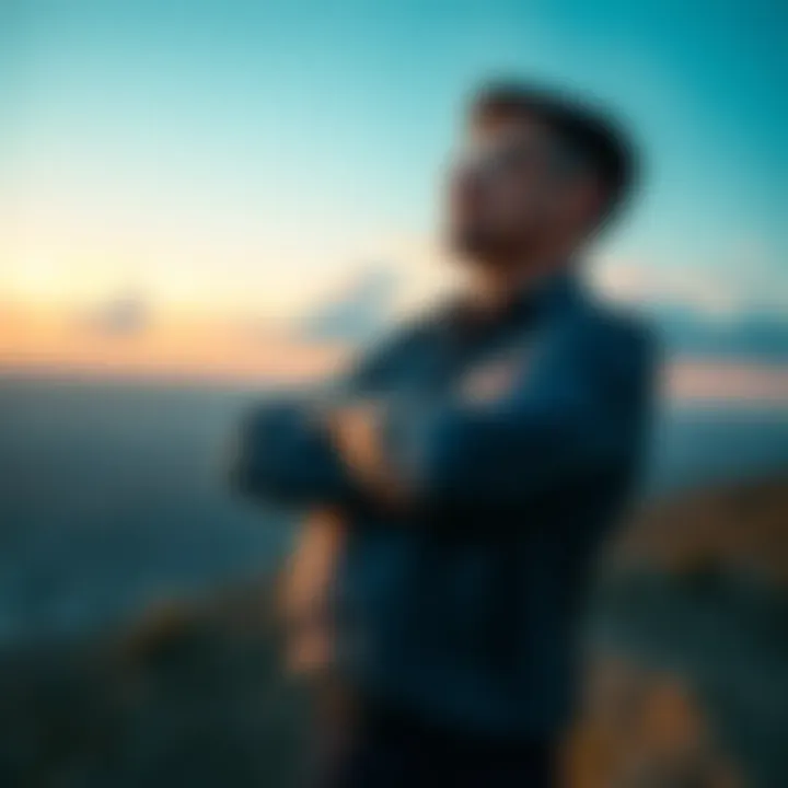A confident individual standing with arms crossed, looking towards the horizon, symbolizing self-belief and determination