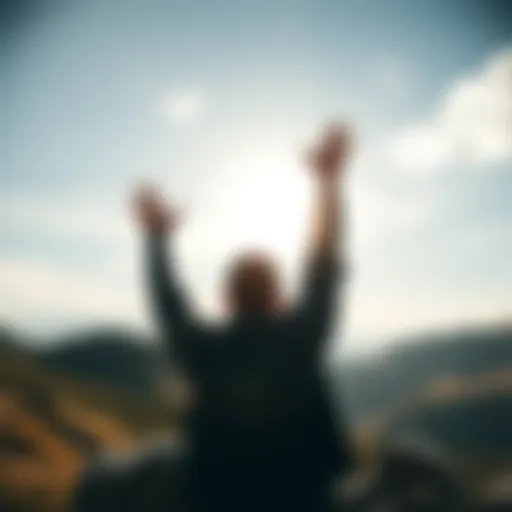 A person raising their hands in the air, standing on a hilltop against a bright sky, symbolizing freedom and liberty in modern society.
